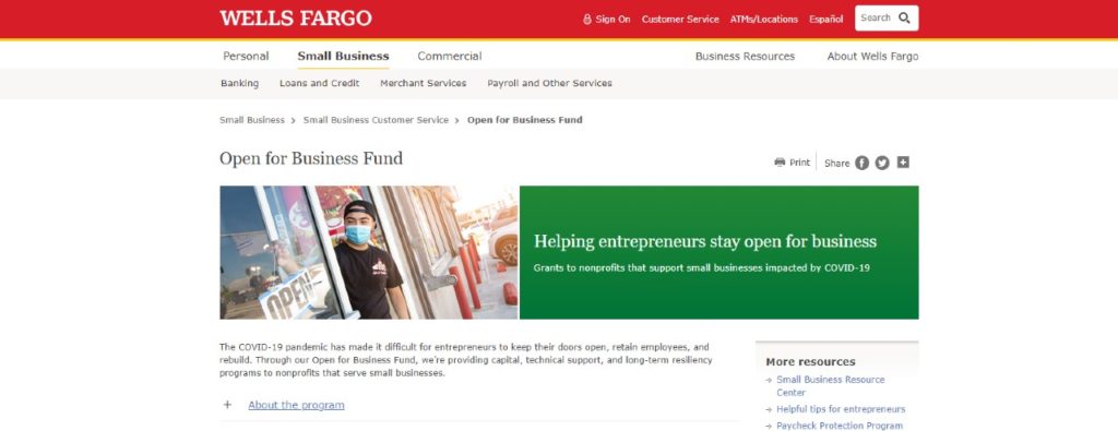 Image of entrepreneur looking outside of his restaurant and an introduction to Wells Fargo Open for Business Fund to help small business during Covid 19.